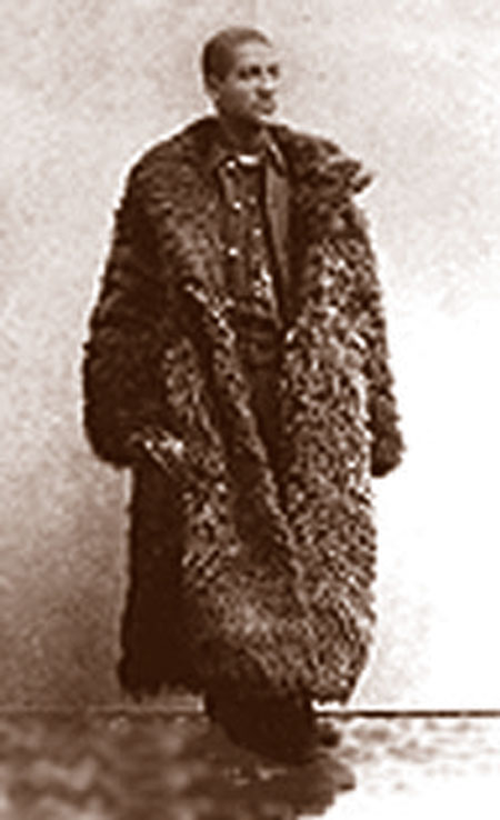 Buffalo Soldiers - A 10th Cavalry soldier in general issue buffalo-hide coat for winter duty. Photo was taken in the late 1870s.