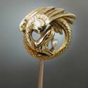 french k coiled griffin holds pearl tiepin for sale from Adin