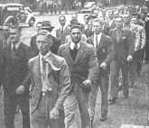 Prospective NCOs march down Queen St