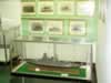 Note photos of the ship behind model