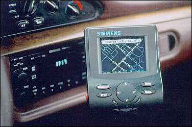 In-vehicle navigation device provides directions graphically and by voice.