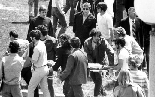 Vietnam War - Kent State, An injured or slain student being moved on a stretcher.